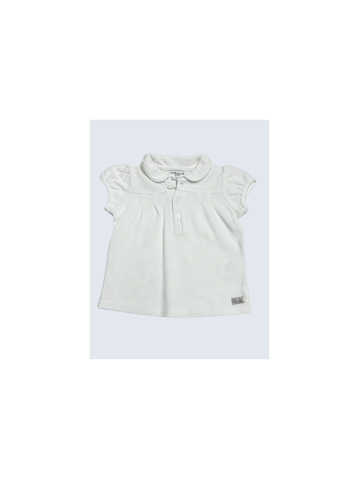 Polo d'occasion Cyrillus 9 Mois pour fille.